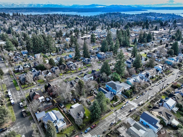 bird's eye view featuring a water and mountain view