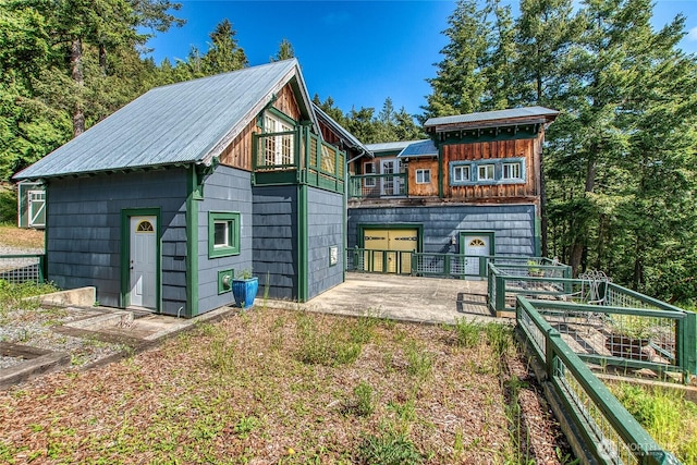 view of outbuilding with a vegetable garden