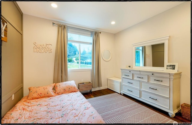 bedroom featuring dark hardwood / wood-style floors