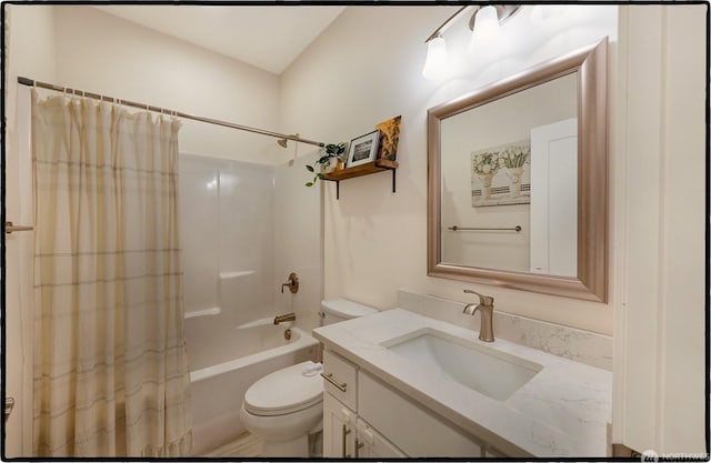 full bathroom with vanity, toilet, and shower / bath combo with shower curtain