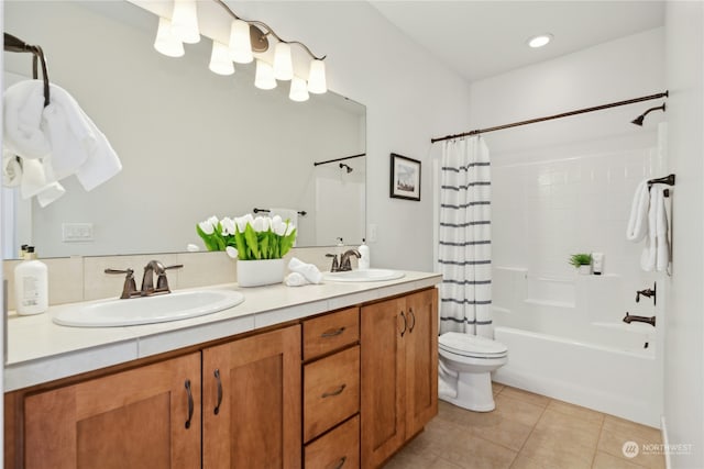 bathroom featuring double vanity, tile patterned flooring, a sink, and shower / tub combo with curtain