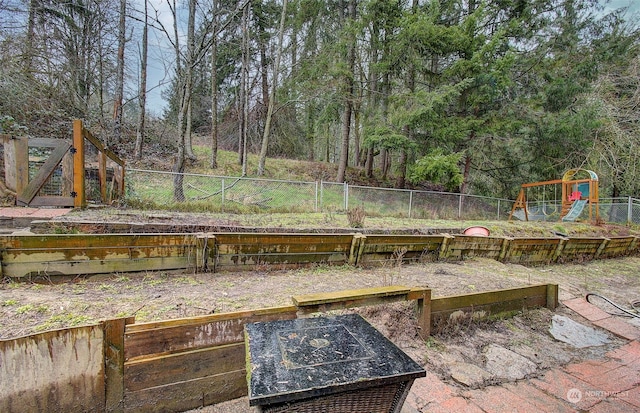 view of patio featuring a playground