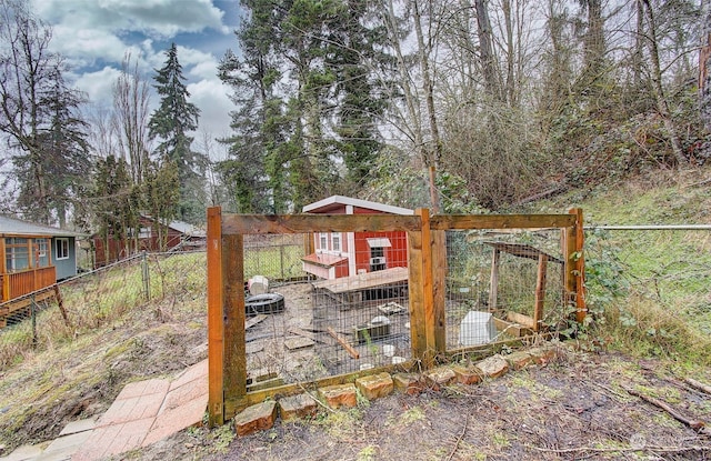 wooden terrace with an outbuilding