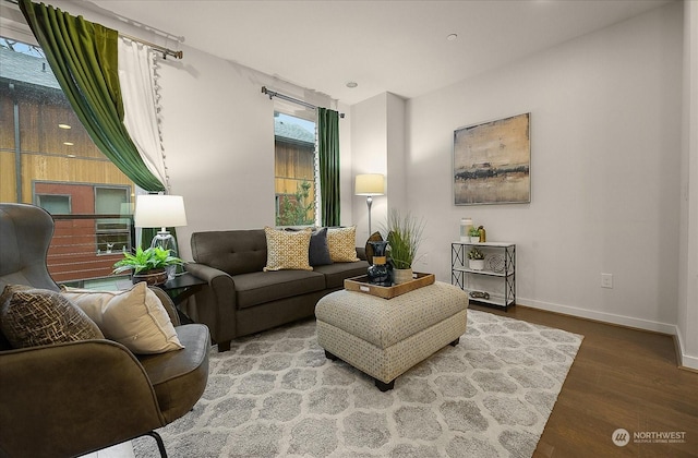 sitting room featuring wood-type flooring