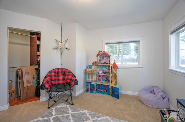 playroom featuring carpet flooring