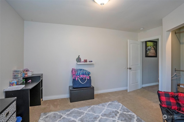 bedroom featuring light colored carpet