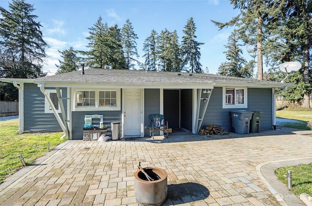 rear view of property with a patio area