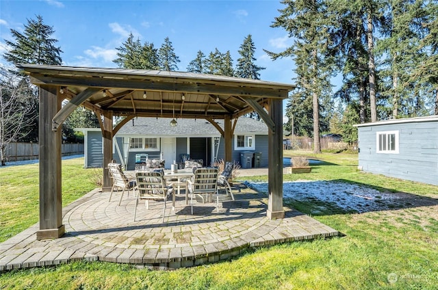 view of patio / terrace featuring a gazebo and an outdoor structure