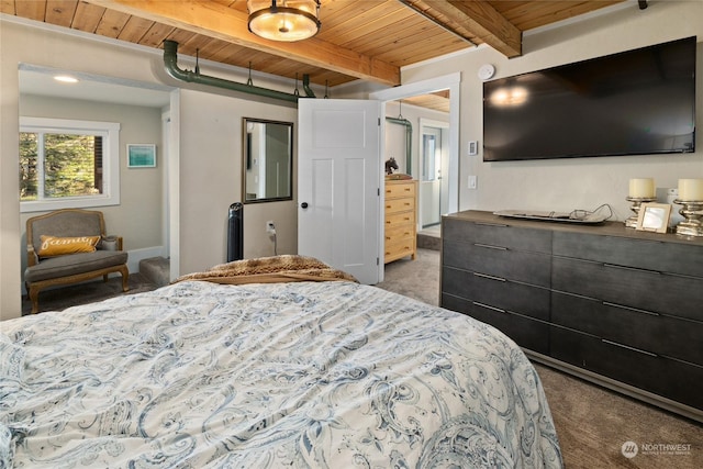 carpeted bedroom featuring beamed ceiling and wooden ceiling