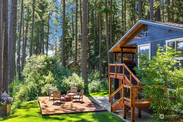 view of yard with a playground and a wooden deck