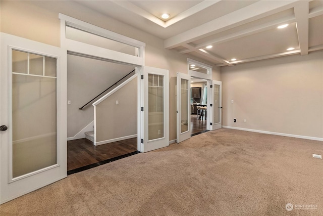 carpeted spare room featuring stairs, french doors, baseboards, and recessed lighting