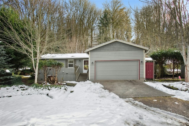 ranch-style house featuring a garage