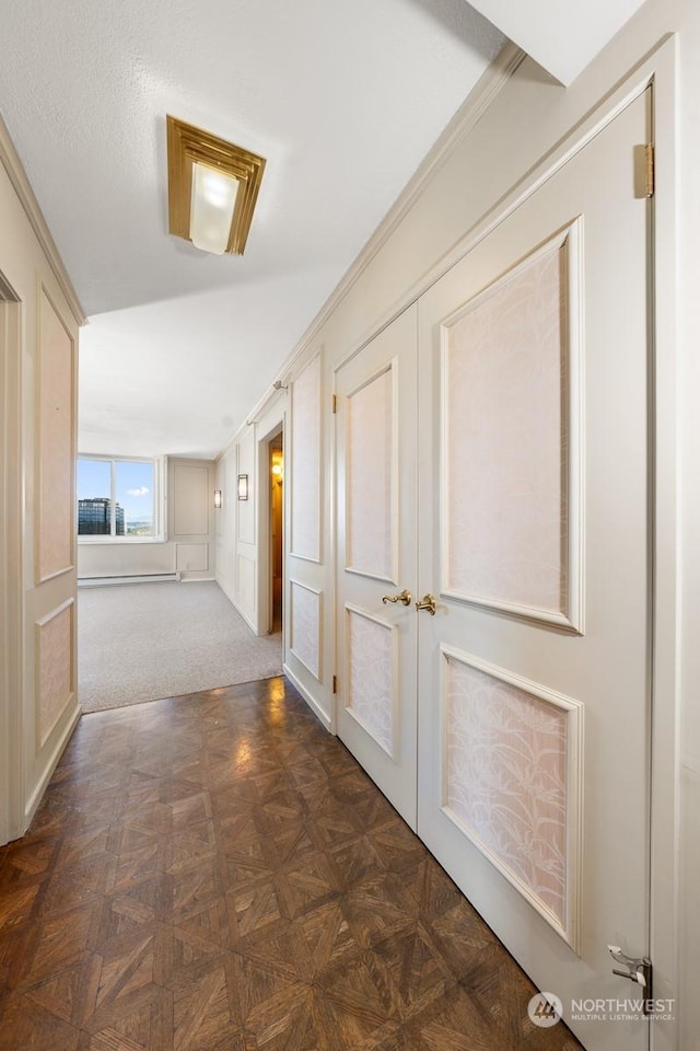 corridor with dark parquet flooring