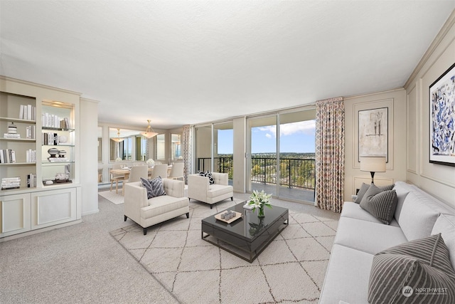 carpeted living room with a wall of windows