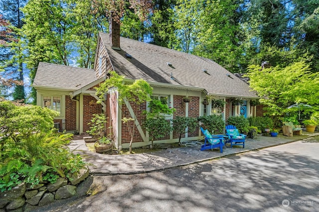 view of front of property with a patio