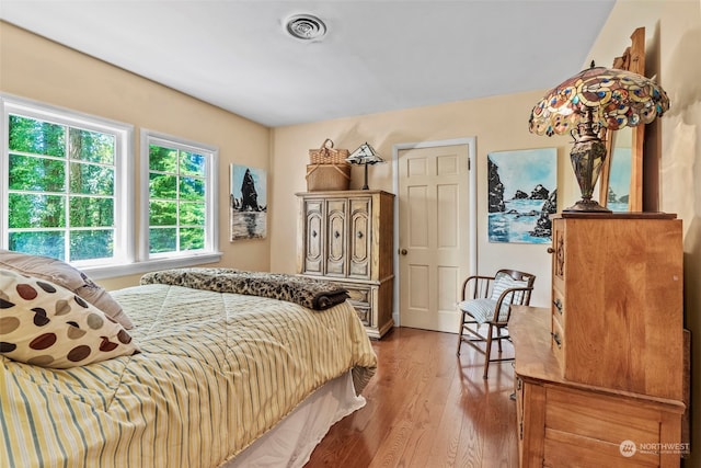 bedroom featuring wood-type flooring