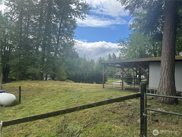 23415 152nd Ave E, Graham, WA 98338 - view of yard featuring an exterior structure and an outdoor structure