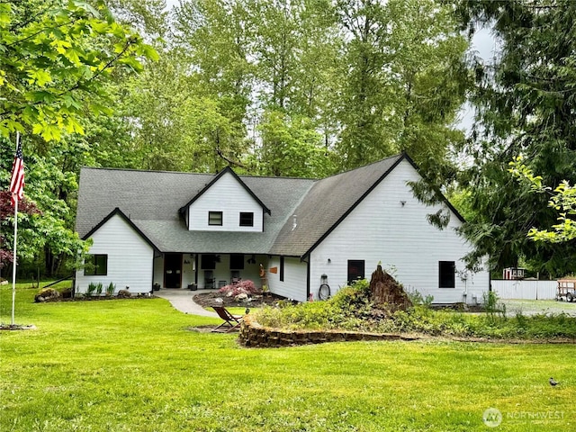 23415 152nd Ave E, Graham, WA 98338 - view of front facade with a front lawn and roof with shingles