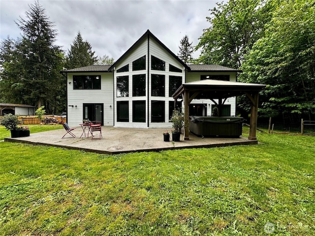 23415 152nd Ave E, Graham, WA 98338 - back of house featuring a hot tub, a patio, and a gazebo