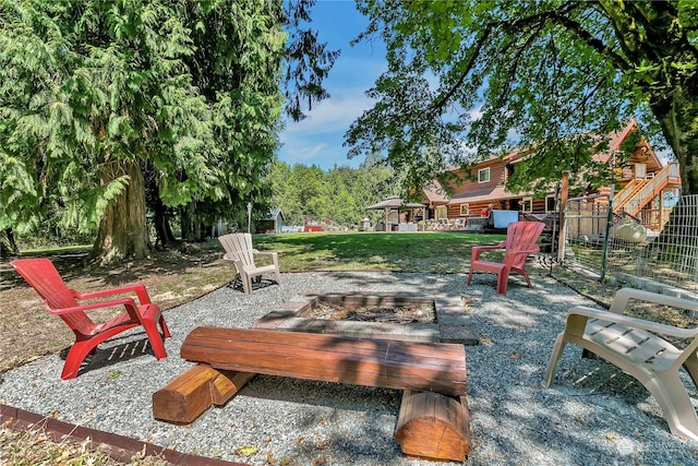 view of patio / terrace featuring a fire pit