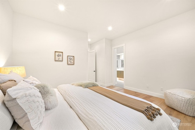 bedroom featuring wood-type flooring