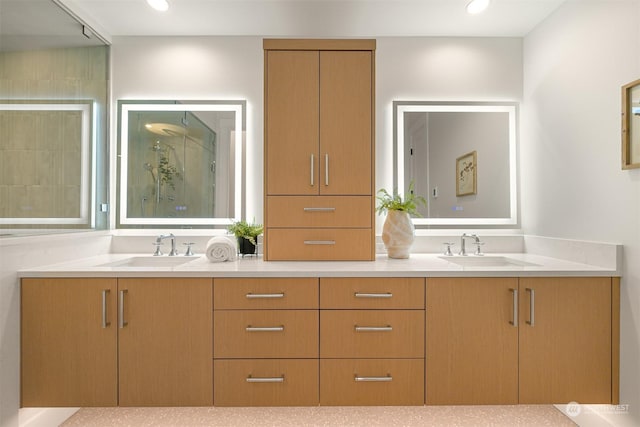 bathroom featuring vanity and a shower