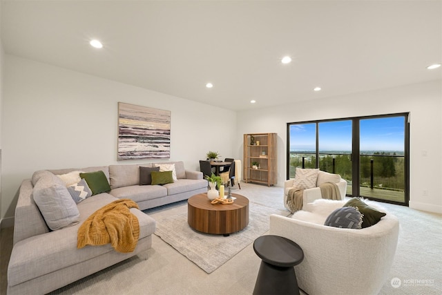 living room featuring light carpet