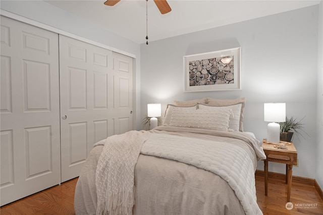 bedroom featuring light hardwood / wood-style flooring, a closet, and ceiling fan