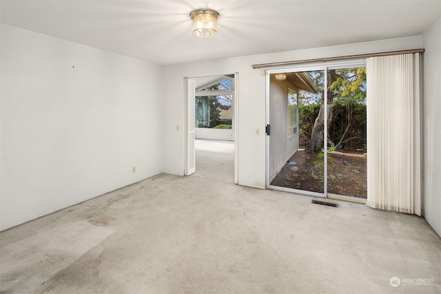 view of carpeted spare room