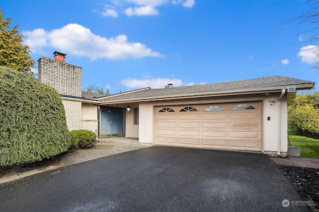 ranch-style house with a garage