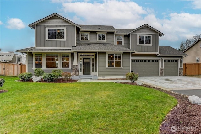 craftsman-style home with a front yard, an attached garage, fence, and board and batten siding