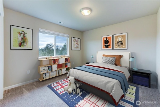 bedroom with visible vents, baseboards, and carpet