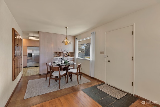 dining room with dark wood-type flooring