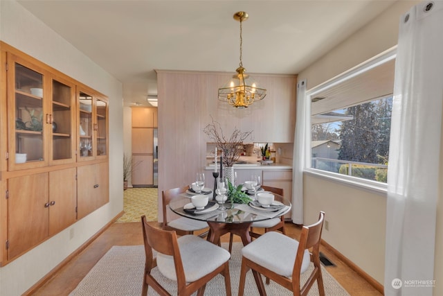 dining room with a chandelier