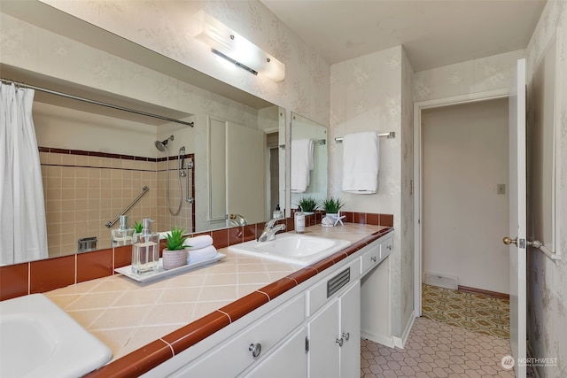 bathroom with vanity and a shower with shower curtain