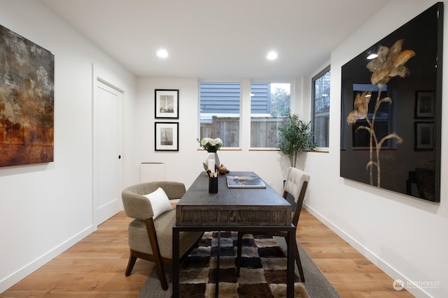 dining space featuring hardwood / wood-style floors