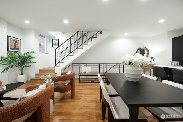 dining area with light hardwood / wood-style flooring