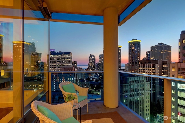 view of balcony at dusk