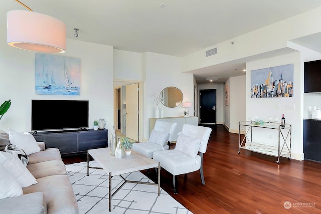 living room with hardwood / wood-style floors