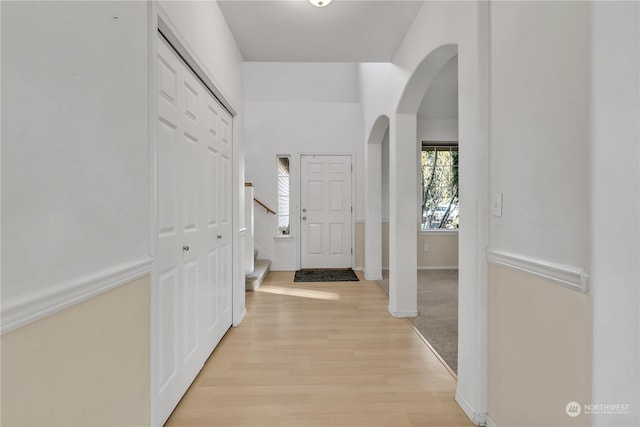 corridor with light wood-type flooring