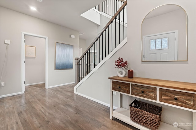 foyer entrance with hardwood / wood-style floors