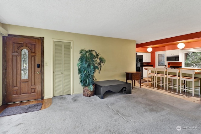 doorway to property featuring a patio area and an outdoor wet bar