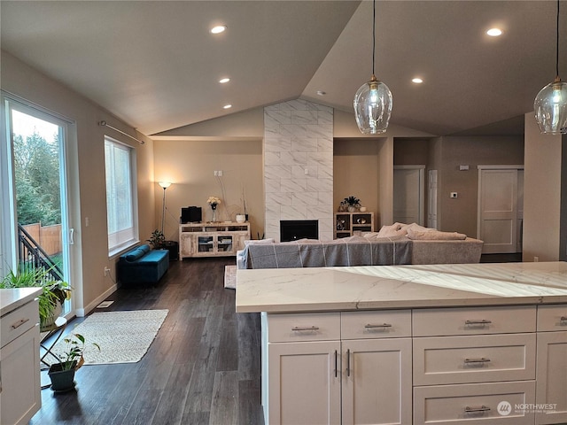 kitchen with decorative light fixtures and white cabinets