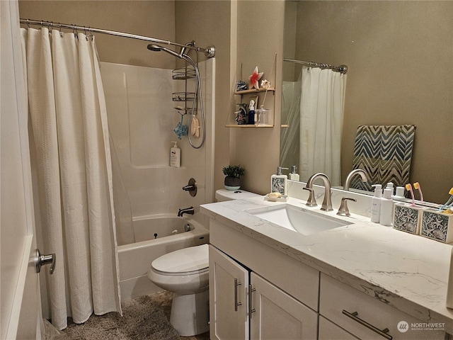 full bathroom featuring vanity, toilet, and shower / tub combo