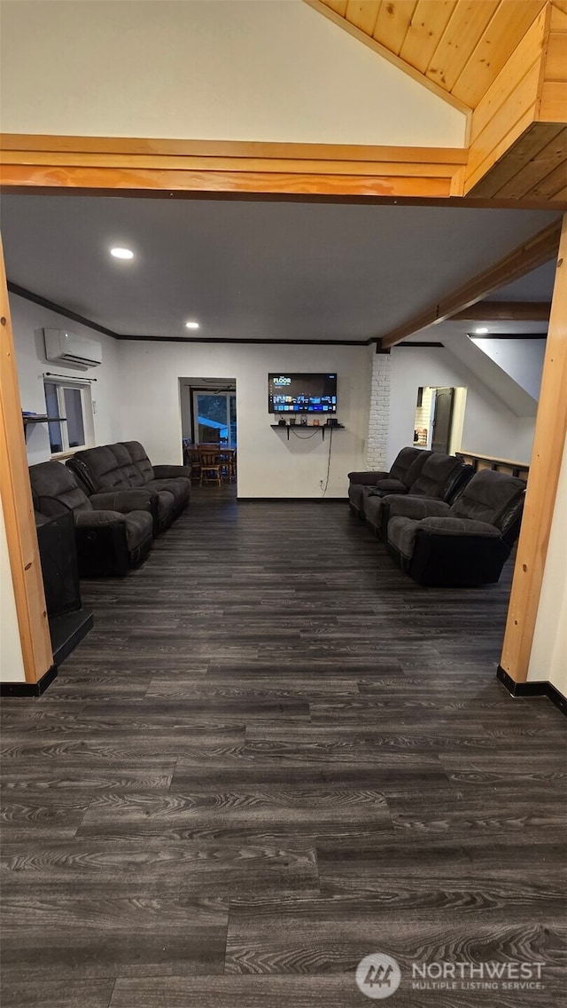 living room with dark hardwood / wood-style flooring, a wall mounted AC, and vaulted ceiling