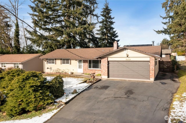 single story home featuring a garage