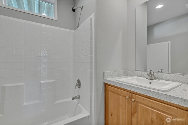 bathroom with vanity and shower / bathtub combination