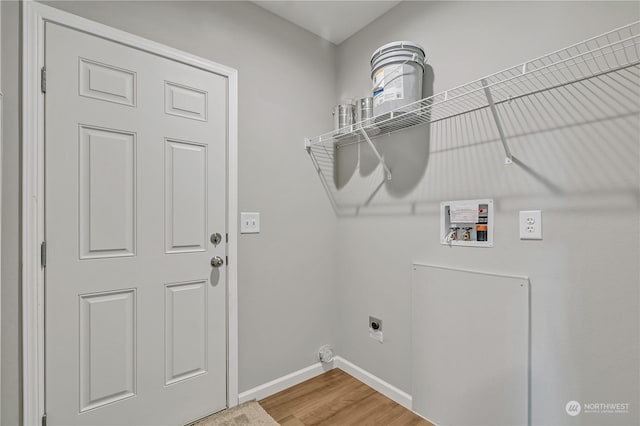 laundry area featuring hookup for a washing machine, wood-type flooring, and hookup for an electric dryer