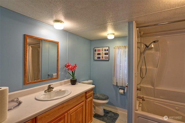 full bathroom featuring tile patterned floors, vanity, a textured ceiling, shower / washtub combination, and toilet