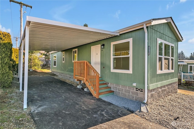 manufactured / mobile home with a carport